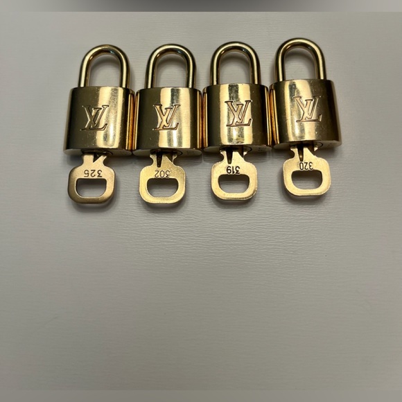 Authentic Louis Vuitton padlocks with single key. 302 and 320 are sold. - Picture 1 of 4